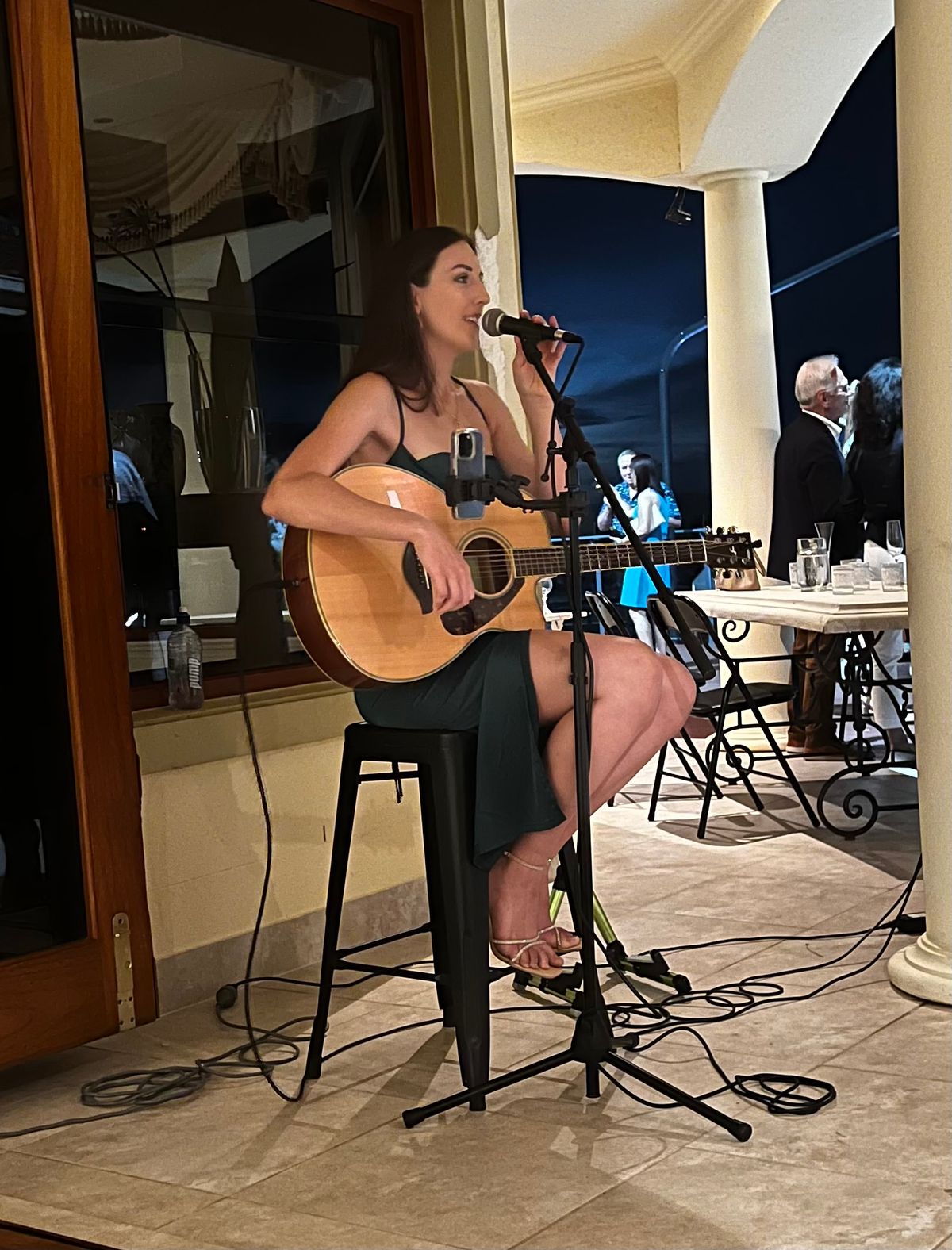 Erin Ritchie, acoustic guitar and singer solo in Gold Coast