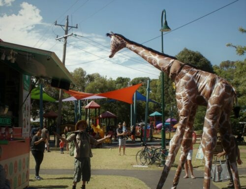 Gemma Giraffe, stilt walker in Melbourne