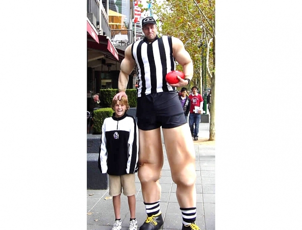 Giant Football Player, stilt walker in Melbourne