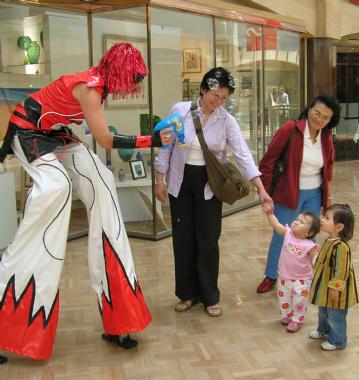 Red Electra, stilt walker in Melbourne