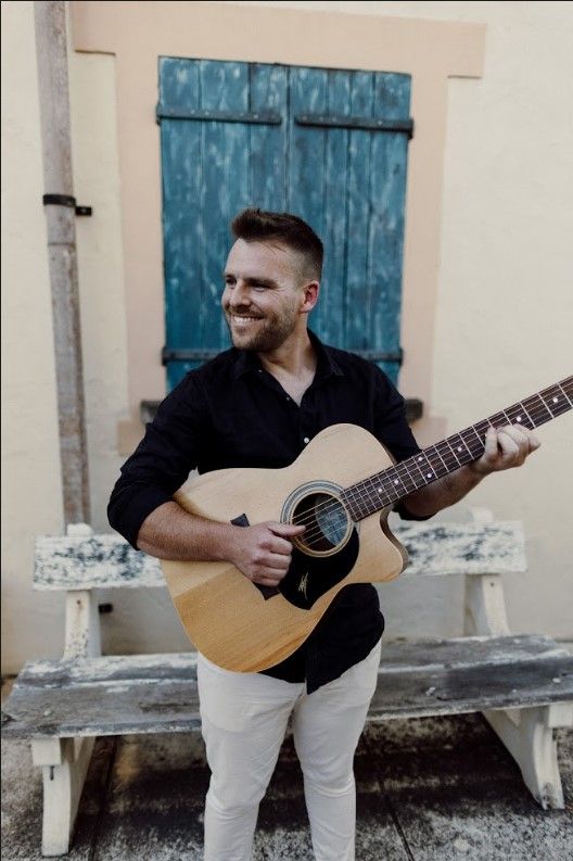 Mully, acoustic guitar and singer solo