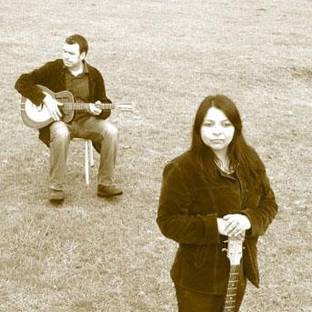 Shey and Scott, acoustic guitar and singer duo in Penguin